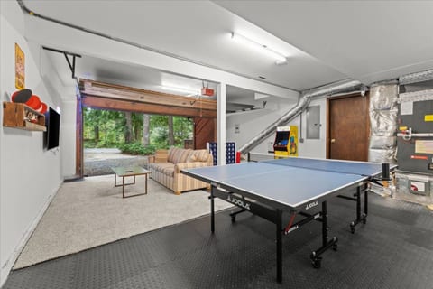 Game Room: Enjoy friendly competition with ping pong and arcade fun in a bright retreat!