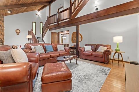 Living Room: Rustic charm meets modern comfort in this spacious retreat, perfect for laughter and relaxation!