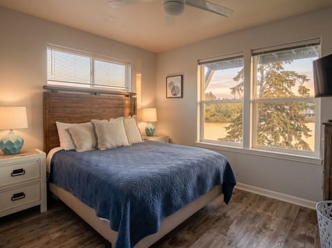 Charming Bedroom: Unwind in this tranquil retreat with scenic views and serene decor!