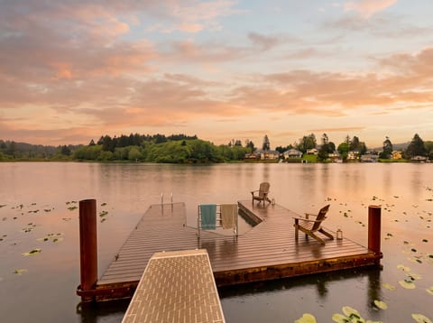 Steps to your shared dock — push off whenever the water calls.
Waterfront Retreat: Unwind on your shared dock while soaking in stunning views!