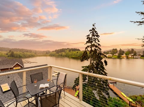 Lake View Deck: Sip cocktails while soaking in breathtaking sunrises and sunsets over the serene waters! Your morning view — Devils Lake from the reverse-living patio