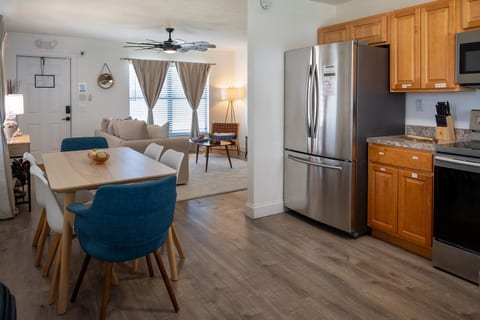2BR – Dining for four between the kitchen and living room