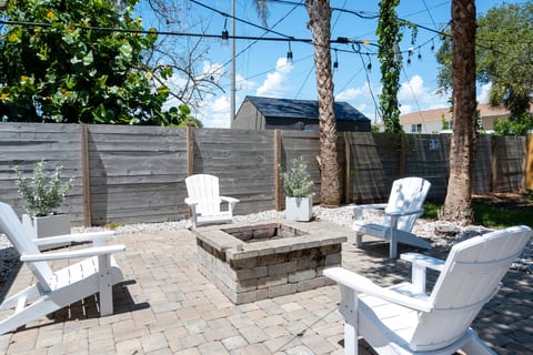 Shared fire pit and seating for all six suites