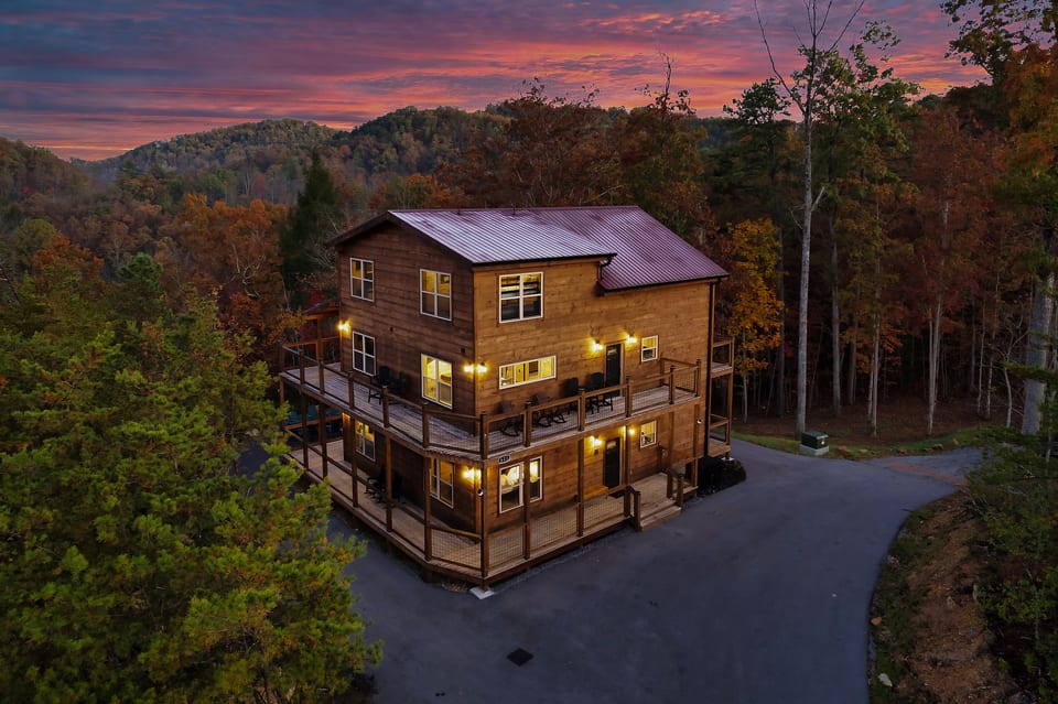 A better look at your private mountain escape — wraparound decks, towering trees, and total seclusion on 2.5 acres, all just minutes from town.