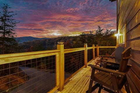 Take in sweeping mountain views from your own private deck — a quiet spot to slow down.