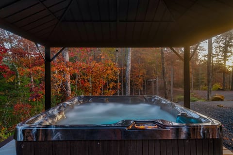 Soak away the day in the private hot tub, tucked beneath the trees with front-row seats to the sunrise.