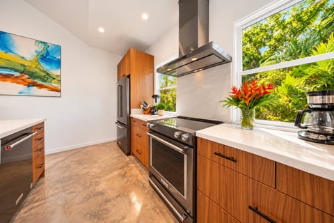 Everything you need to cook at home, with tropical views right outside the kitchen.