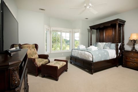 Queen bedroom overlooking golf course and access to balcony