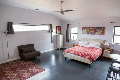 The apartment has great natural lighting as well as blackout curtains for the windows and glass door.