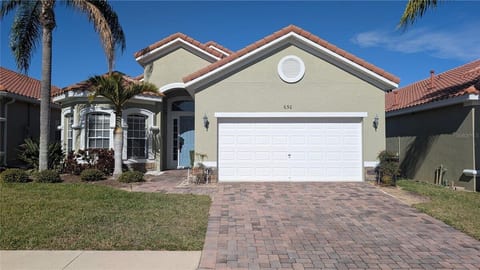 Front of this beautiful pool home with parking for two vehicles on the paved driveway (please no oversized/long-bed vehicles, no street parking)