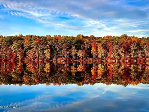 The river is beautiful in the fall.