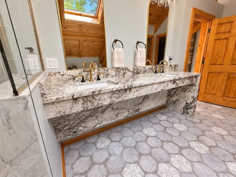 Primary bathroom with soaker tub and 2 person shower.