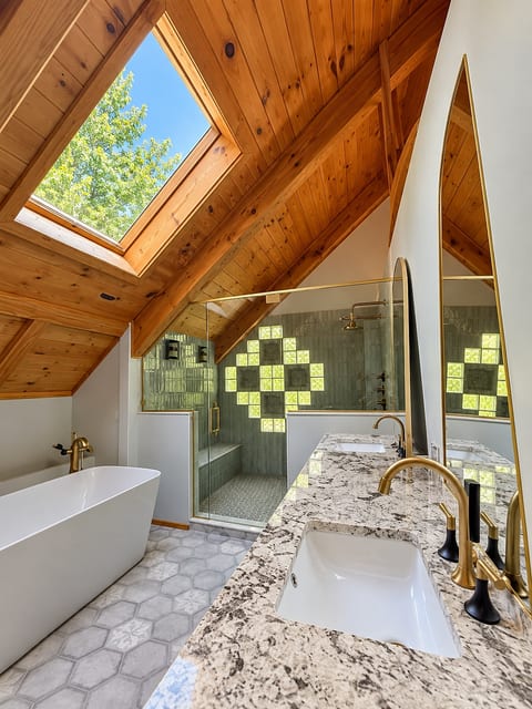 Primary bathroom upstairs soaker tub and 2 person shower.