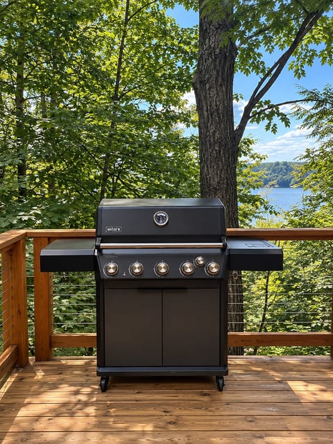 Gas grill outside patio off the kitchen and living area deck.