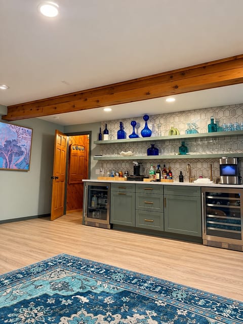 Downstairs living area and bar, Nespresso machine, ice machine and mini fridge.