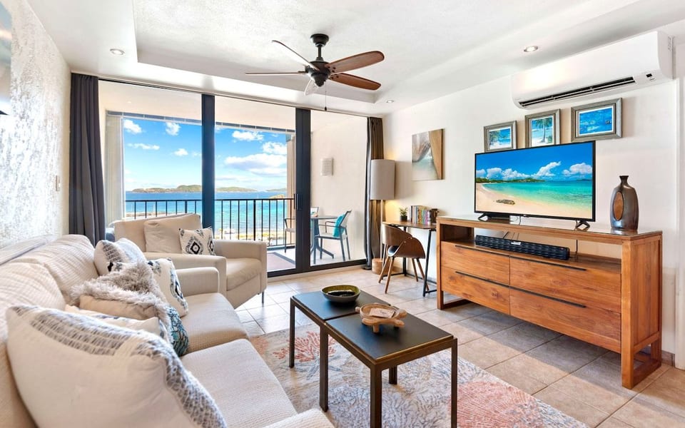 Gorgeously appointed living room with Crate&Barrel furniture that leads into the patio with stunning views!
