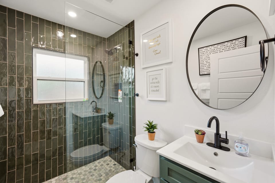 Stylish spa-like bathroom with walk-in glass shower and modern finishes