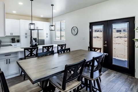 Seating for 9 between the bar height table and counter top.

