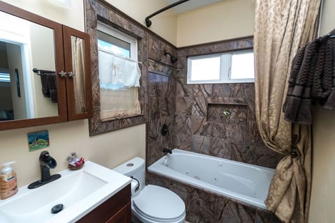 Beautiful rainforest hot tub/shower bathroom