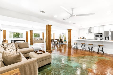 Bright open-concept living with modern kitchen and spacious seating
