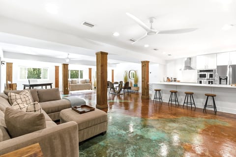 Bright open-concept living space. Top-of-the-line kitchen, dining, sleeping spaces and living room lounge.