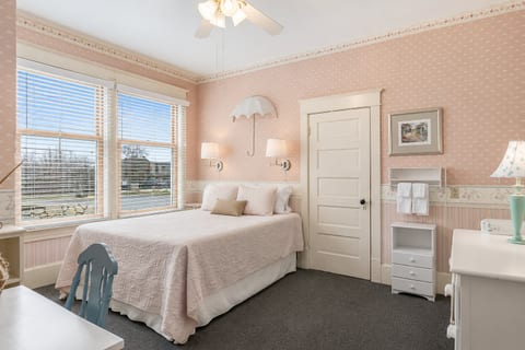 Bright Mackinac bedroom with queen bed