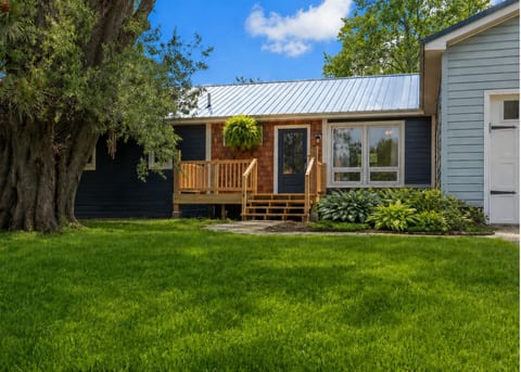 Charming single level home surrounded by mature trees