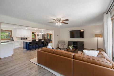 Spacious living room with comfortable sectional and Smart TV