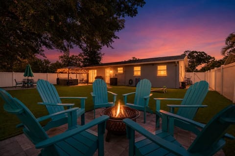 Your private backyard oasis—unwind under the stars with a fire and make some s’mores.