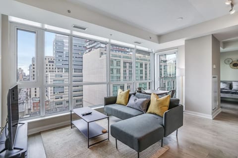 High-Floor Downtown 1BR+Den | City Views