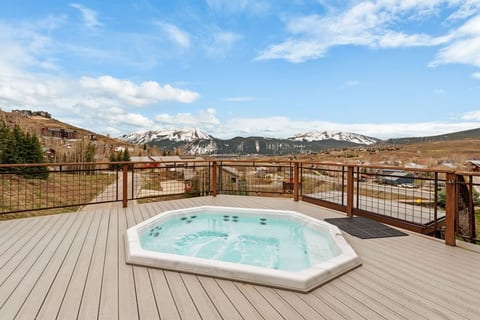Shared building hot tub. Open daily 10:00 AM to 10:00 PM.  Shared gas grill on the hot tub deck