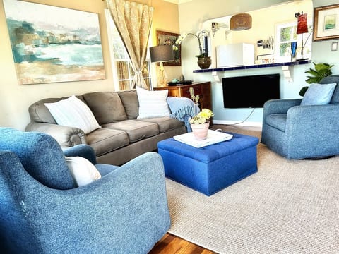 Larger living room queen size sleeper sofa w two swivel rockers