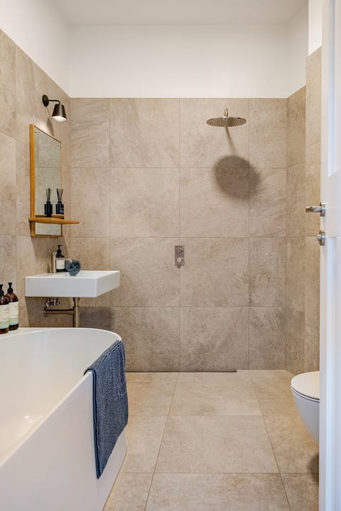 Organic luxury toiletries and Egyptian Cotton towels reflect the quality of the apartment