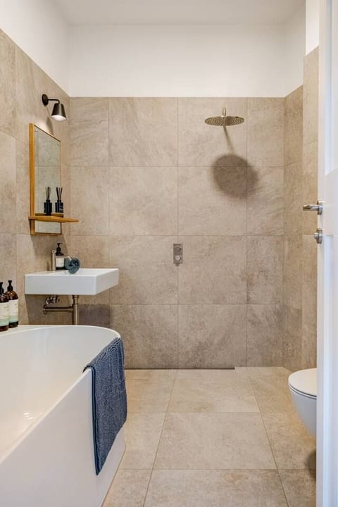 Organic luxury toiletries and Egyptian Cotton towels reflect the quality of the apartment