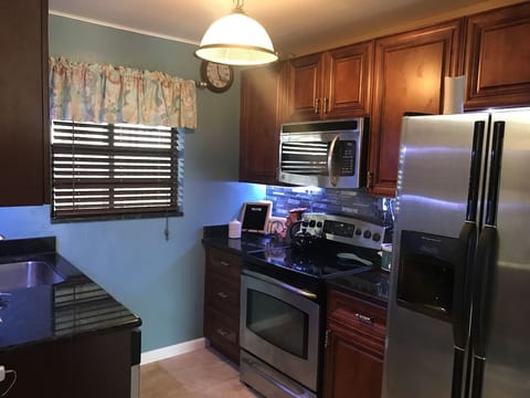 New kitchen just completed Jan, '20 - all wood cabinets, granite countertops.