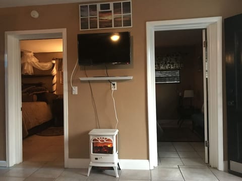 Wall mounted flat screens in LR and each bedroom.