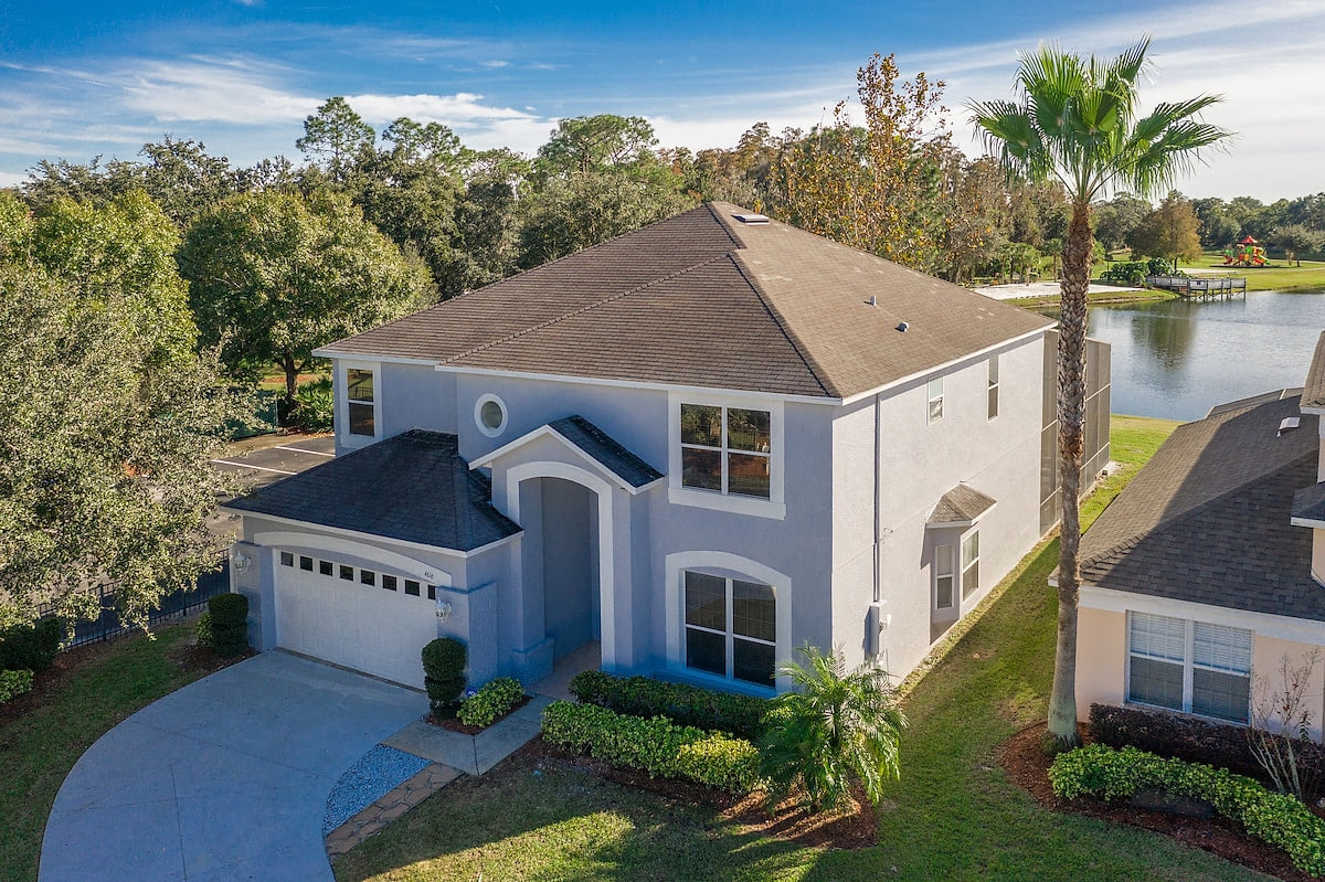 Lakeside house, huge south facing pool with spa,  lake view, Disney at 8 miles