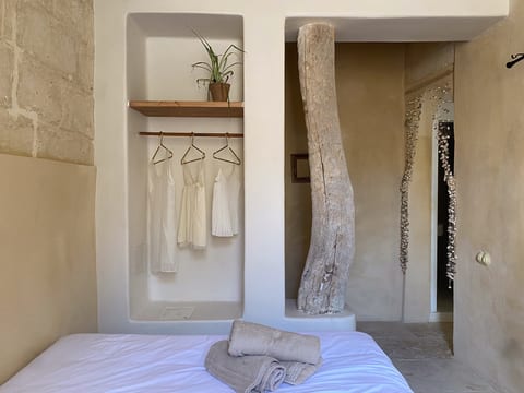 Minimalist bedroom with organic design details and calming neutral tones