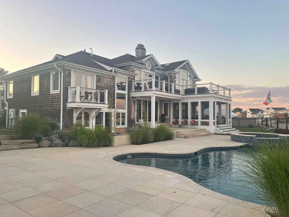 The Hamptons without the 4 hour drive. Architecturally significant Cedar Shake beach oasis on a private court with breathtaking views of the Great South Bay.