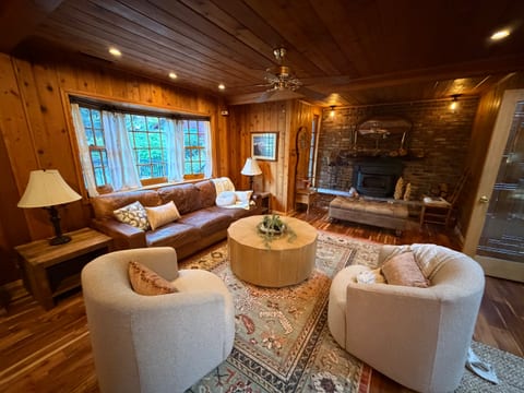 Cozy cabin living room with fireplace