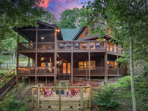 Spacious woodland log cabin with wraparound decks and cozy fire pit patio