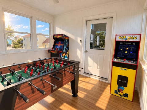 NEW game room with two arcade games and a foosball table for easy family fun between beach trips.