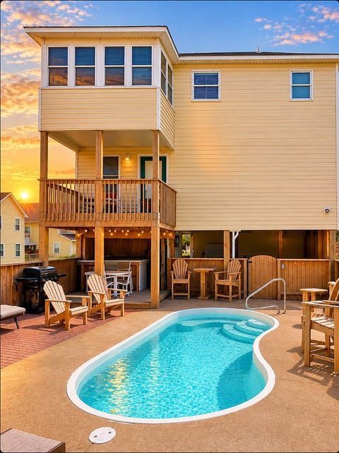 Golden hour by the pool, with an Outer Banks sunset to end the day.