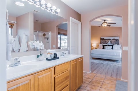 Spacious ensuite with double vanity and seamless bedroom access