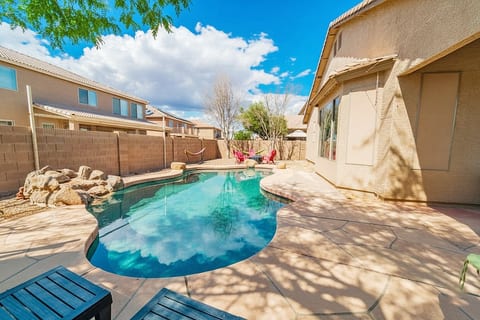 Sunny backyard oasis with private pool, hammock & lounge area
