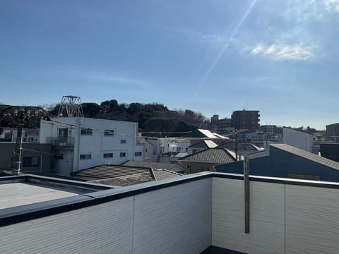 A view of a mountain part nearby in the roof balcony here~