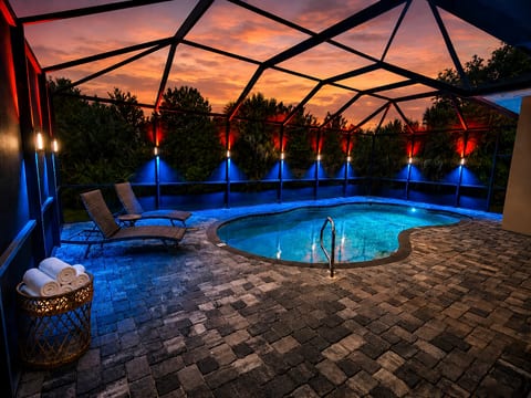 Enjoy evenings by your private saltwater pool, with complimentary pool heating included in every stay. Heating target: 85°F (29°C), weather permitting. Pool and enclosure lighting make the lanai especially inviting after sunset.