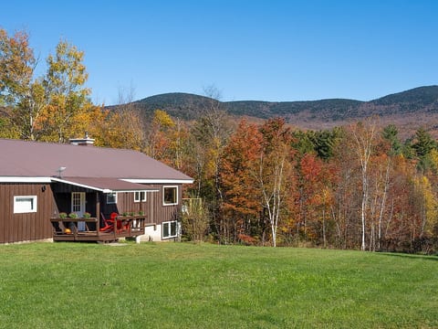 Cabin and mountains in the autumn