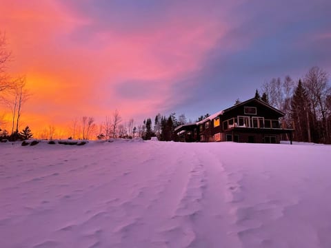 Winter sunset behind our cabin.