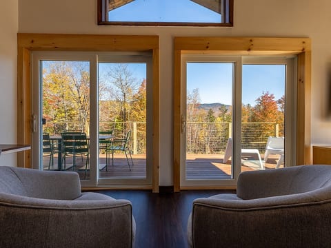 The living room windows look over the mountains to the east, perfect for catching the morning sunrise!